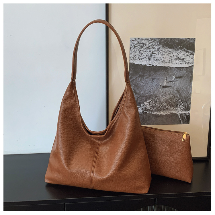 Bolso de cubo portátil de sentido avanzado transfronterizo Bolso de hombro de moda de todo fósforo retro femenino Bolso de viaje de gran capacidad casual