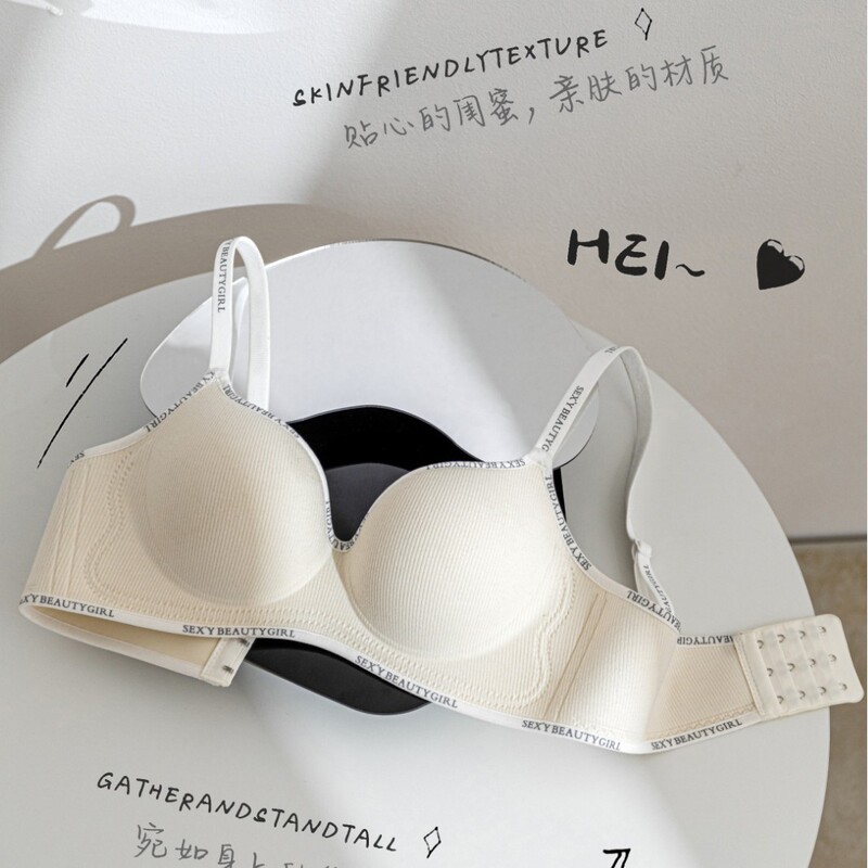 胸が小さい女性向けの厚いカップのシームレスなガールズプッシュアップブラジャー、女性用ノンワイヤー拡大コミックブラジャー|undefined