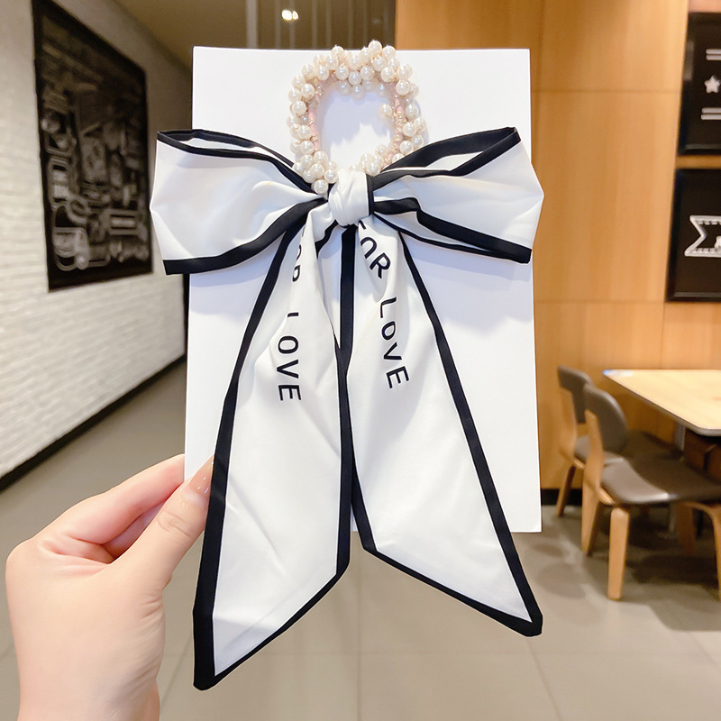 Banda de pelo de bufanda de seda corbata de pelo femenina Shixi Cinta de lazo de perla sale todo partido cuerda de cabeza Shixi 2021 cabello nuevo