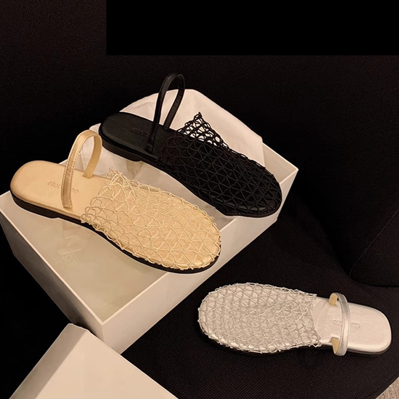 Grava Madre verano nuevo estilo de moda de pan de red hueco con playa de mitad zapatillas de fondo plano para mujeres de verano