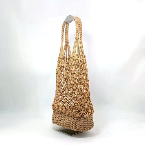 New hollow bucket hand-woven straw bag women's shoulder handbag ins style fishnet forest beach bag