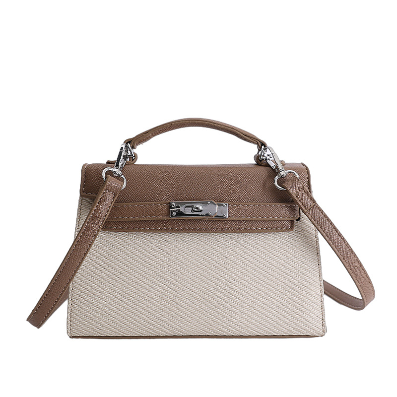 Textura de nicho bolso de diseño de mujer 2026 nuevo bolso Kylie color contraste diario simple viaje mochila de hombro
