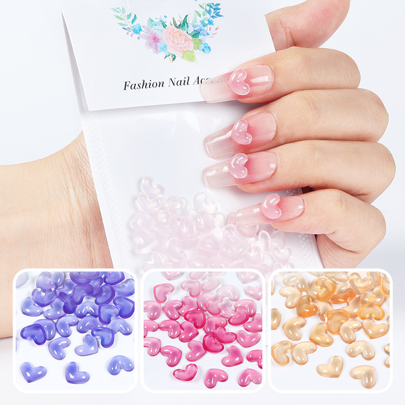 50颗新款日系美甲遇光变色爱心冰透树脂钻饰光变透明桃心8MM
