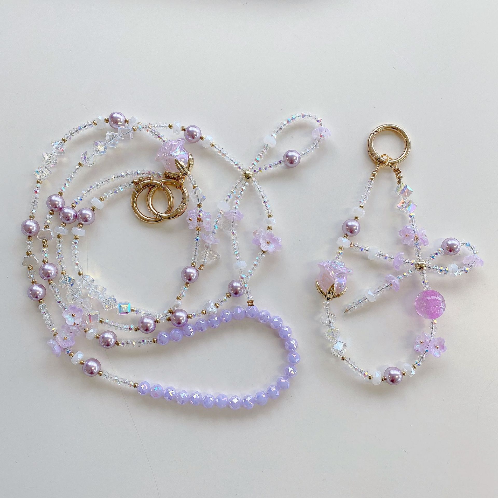 Cadena de teléfono móvil de alta gama hecha a mano boutique, tulipán femenino, cadena larga púrpura, cordón de teléfono móvil de moda, colgante de mensajero largo