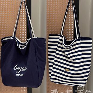[Live broadcast exclusive] Striped double-sided shoulder bag 25 years new simple student commuting hand canvas bag