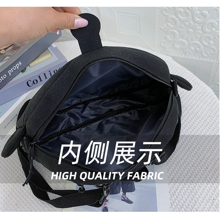 The new 2024 children's egg-shaped party backpack is a cute cartoon canvas single-shoulder bag and a fashionable and stylish small backpack undefined