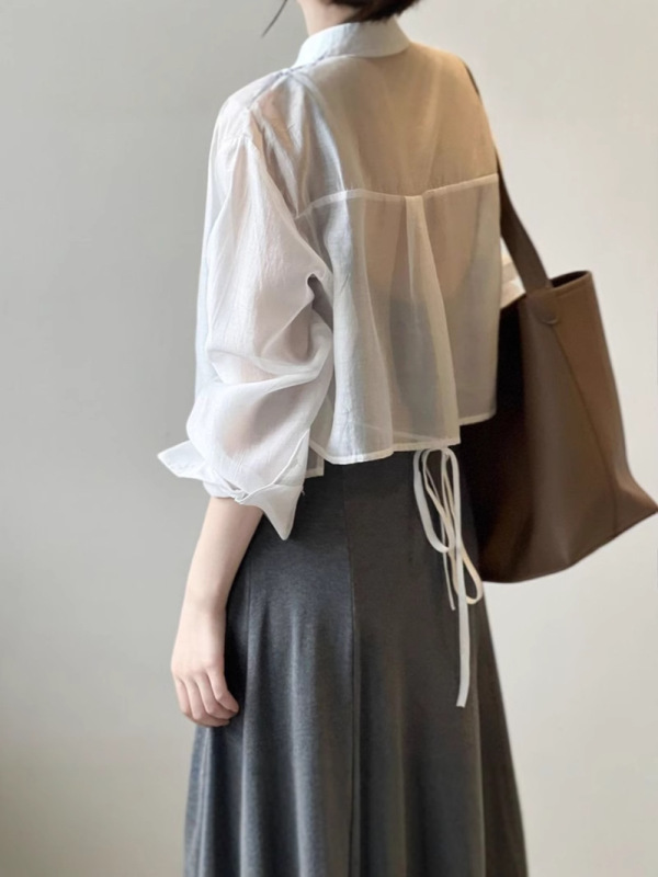 薄い長袖の日焼け止めのシフォンのシャツの女性のデザイン感があります。|undefined