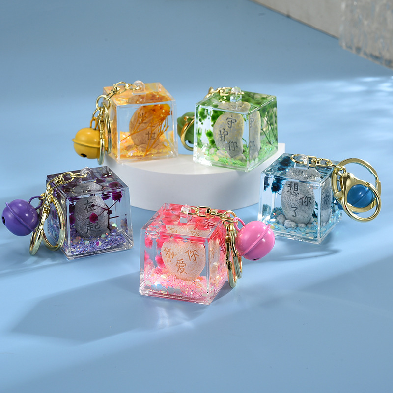 Online celebrity oil pendant Qixi couple backpack ornaments lettering car gift keychain wholesale quicksand acrylic