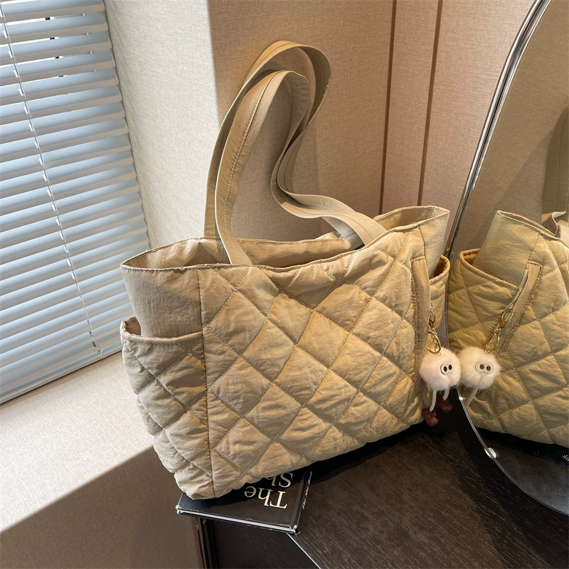 Water repellent protective bag with diamond pattern, universal one-shoulder bag