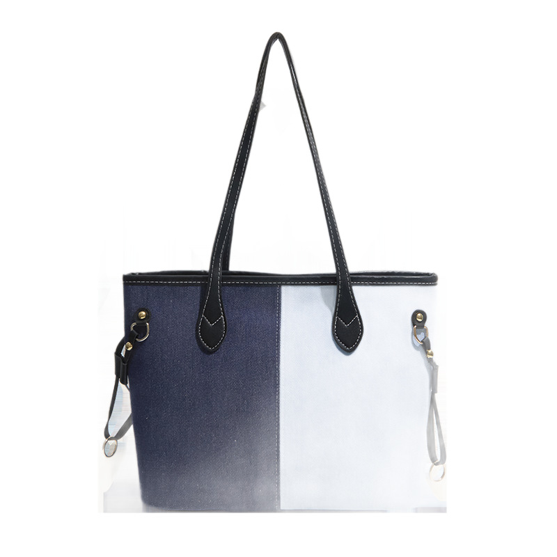 Bolsa de mano de gran capacidad para mujeres 2026 nueva moda jeans empalme color contraste bolso de hombro de viaje simple bolsa de mano
