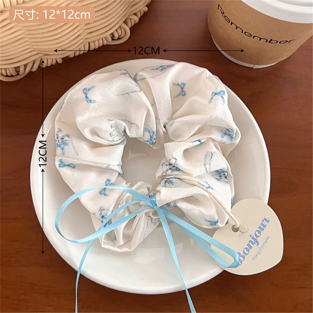 1 ¿ lindo gatito con lazo de pelo grueso