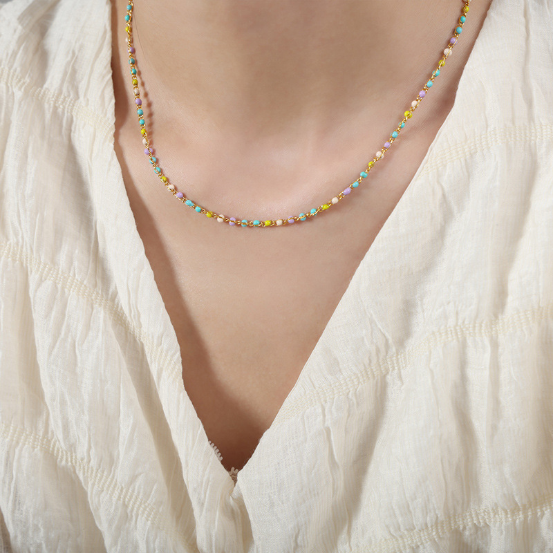 Luz de lujo personalidad nicho color eje colorido goteo collar de aceite de titanio acero todo fósforo de hadas temperamento pulsera joyería de moda para las mujeres