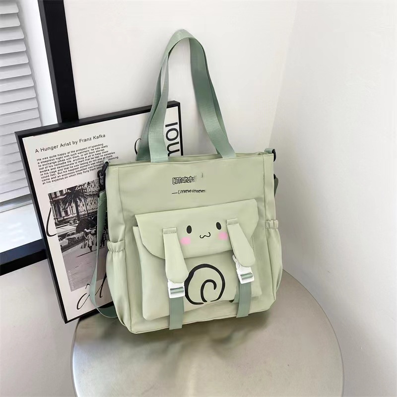 2024 estudiantes bolso de estilo explosivo simple y de gran capacidad nuevo bolso de mensajero de un solo hombro de moda para mujer bolso de viaje