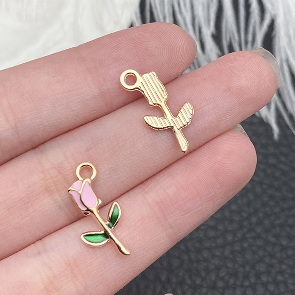 1 Rosa rosa con gotas de aceite 9x18mm - 12317 - 0,5g