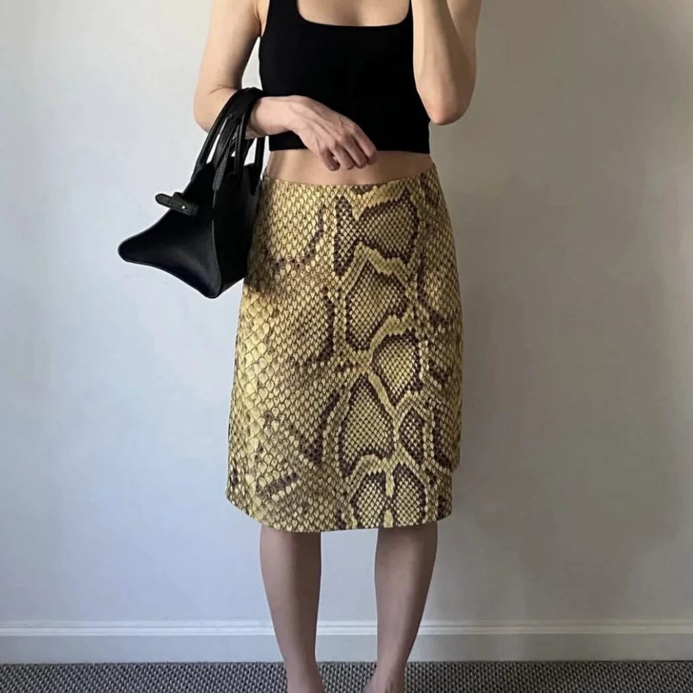 American Retro Sexy Yellow-Toned Snake Print Drapey Midi Skirt with a Matte Leather Feel and a Fitted Hip-Hugging Design for Work Wear