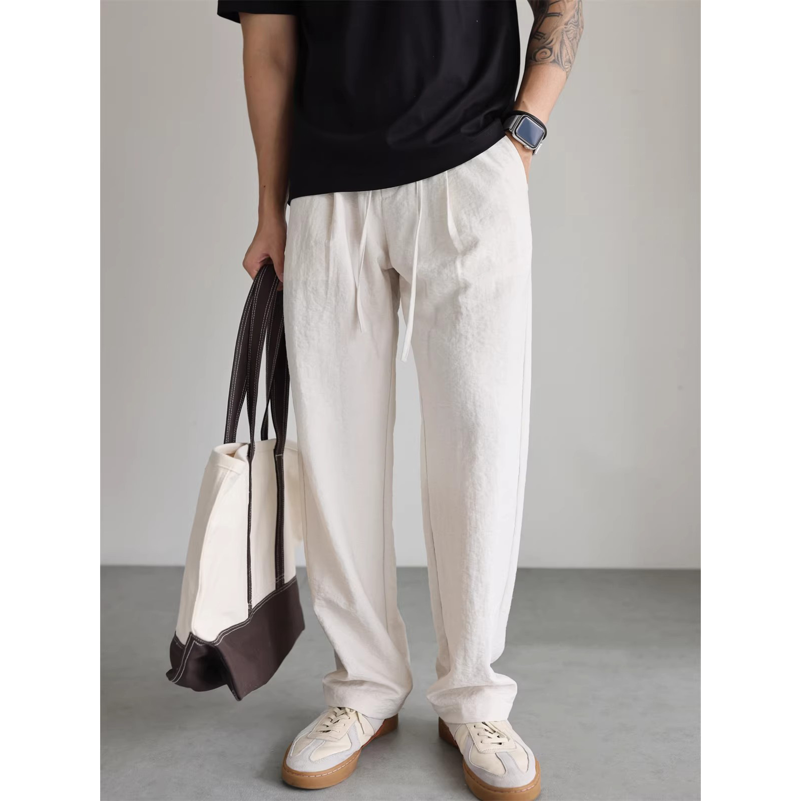 Pantalones de lino de seda de hielo no arrugados cintura elástica pantalones de pierna ancha hombre fábrica transfronteriza al por mayor poliéster imitación de lino
