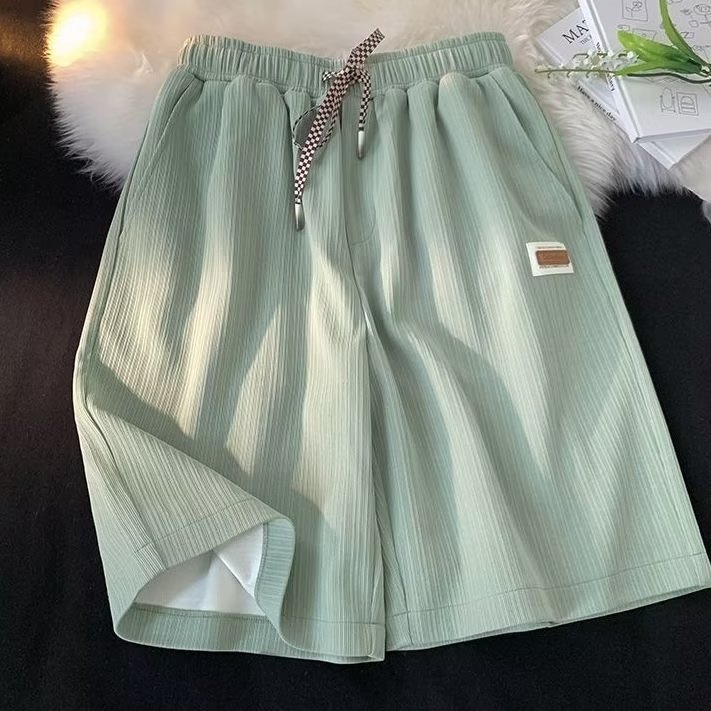 Pantalones cortos de seda de hielo de verano serie de sal suelta para hombres 2023 nuevos pantalones casuales de pierna ancha ins pantalones cortos rectos de moda