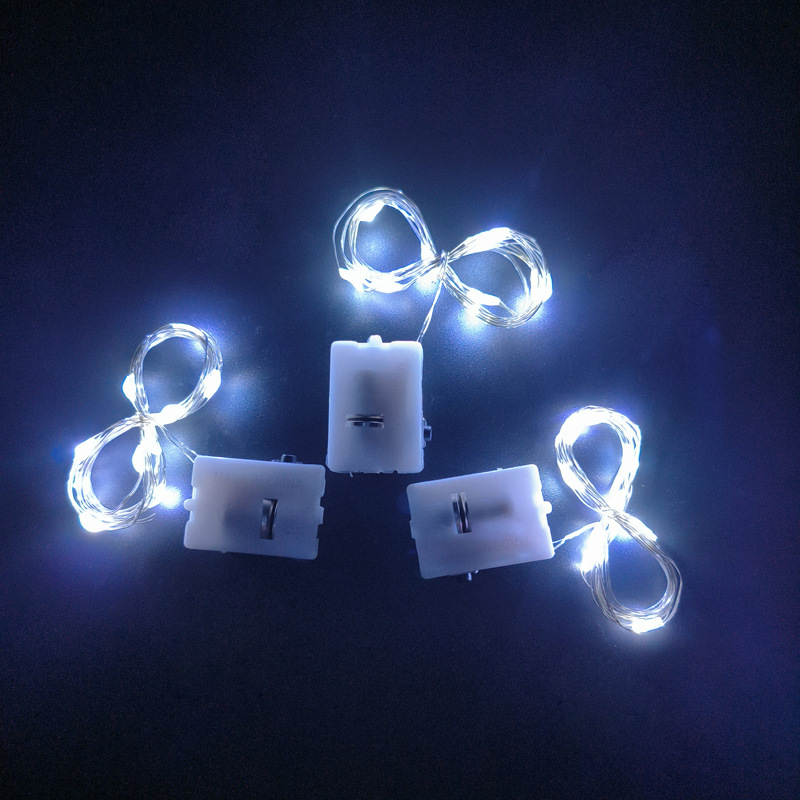 65000810 led铜线小白盒灯串-1米10灯 正白