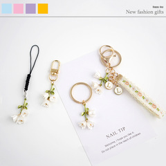 美しい白鈴蘭の携帯チェーンの花の携帯電話の縄のuディスクのリュックサックのキーホルダーのペンダントの花の携帯電話の自動車のペンダント