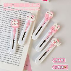 かわいい子猫の美工刀の小さいサイズのアニメの携帯学生は封筒の裁断刀の事務の速達を分解して包丁を出して卸売りします。