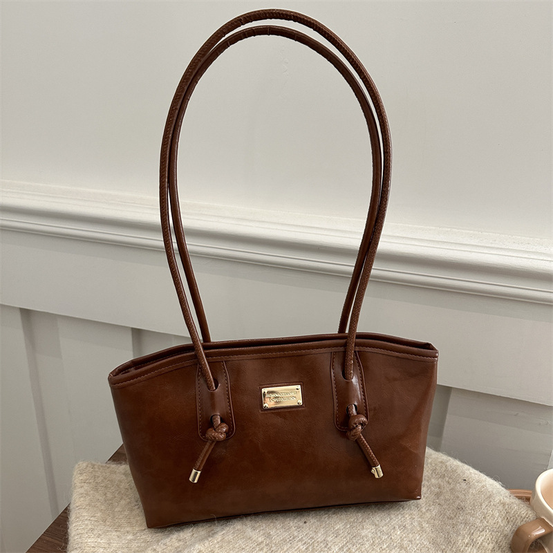 Alta sensación de viaje retro bolsas de gran capacidad para mujeres 2024 nuevo otoño invierno versátil bolsas de hombro de brazo bolsas especiales