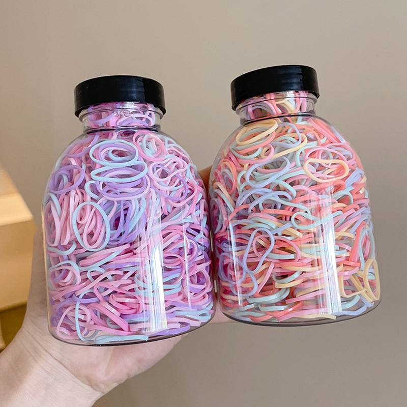 Las bandas de goma desechables de color para niños no dañan el cabello, alta elasticidad y durabilidad