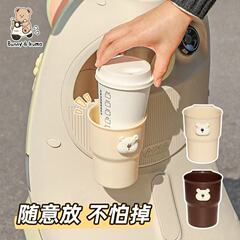 電動車のコップの棚のかわいい漫画のオートバイのミルクティーの棚の自転車の飲み物の水筒の棚の置物の収納棚