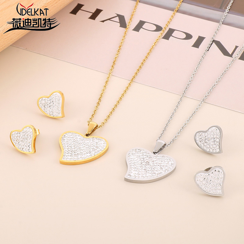 Juego de joyería de acero de titanio con collar y pendientes de corazón con circonitas estilo europeo americano
