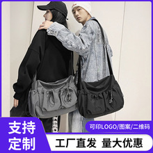 文艺青年单肩包女ins风纯色情侣时尚工装斜挎包潮牌小众邮差包男