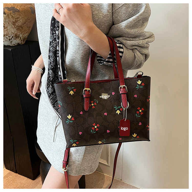 Bolsos de moda europeos y americanos transfronterizos, populares femeninos, bolsos de mensajero de un solo hombro con impresión retro de gran capacidad