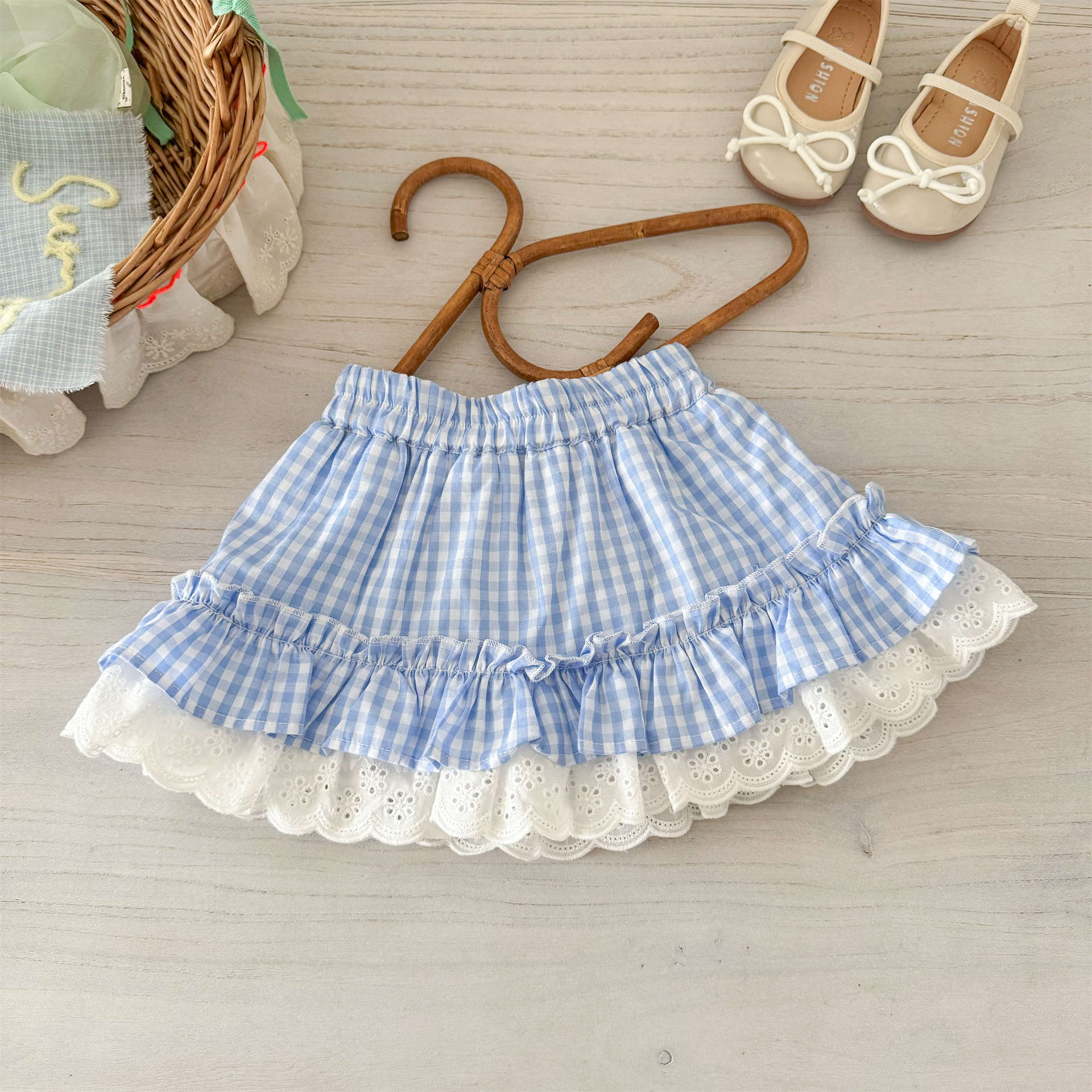 Xianning siete ropa para niños falda corta para niñas 25 verano nuevo estilo estilo occidental bebé falda de pastel a cuadros única y hermosa