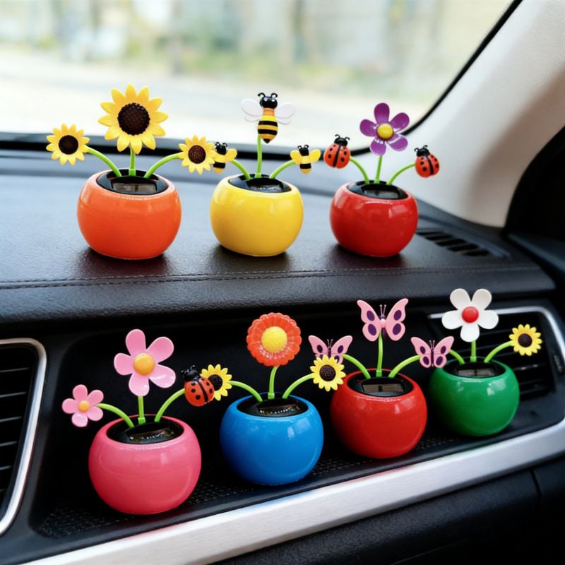 Wholesale creative solar intelligent induction swing sunflower shaking head apple flower car decoration cross-border decoration