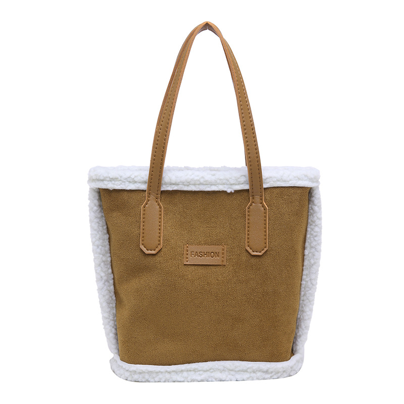 Personalidad de la moda de la axila bolso de cubo de invierno 2024 nuevo estilo casual estilo exterior simple retro hombro bolso de viaje portátil
