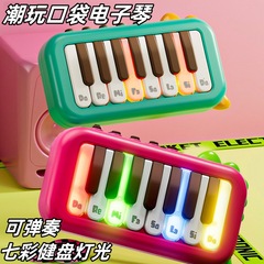 新しい子供のポケットの電子ピアノのおもちゃの男の子の女の子の益智早教の音楽のおもちゃの越境のおもちゃ
