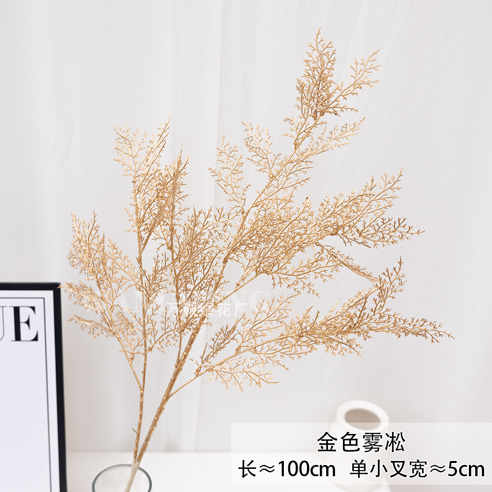 Flores artificiales doradas para Navidad