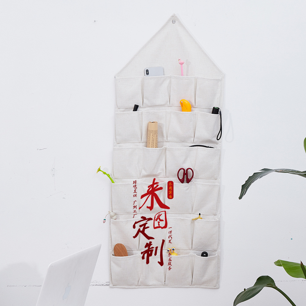 La imagen se puede fijar en la pared triángulo perforado bolsa de almacenamiento de algodón y lino que organiza la sala de estar bolsa de almacenamiento de artículos diversos detrás de la puerta