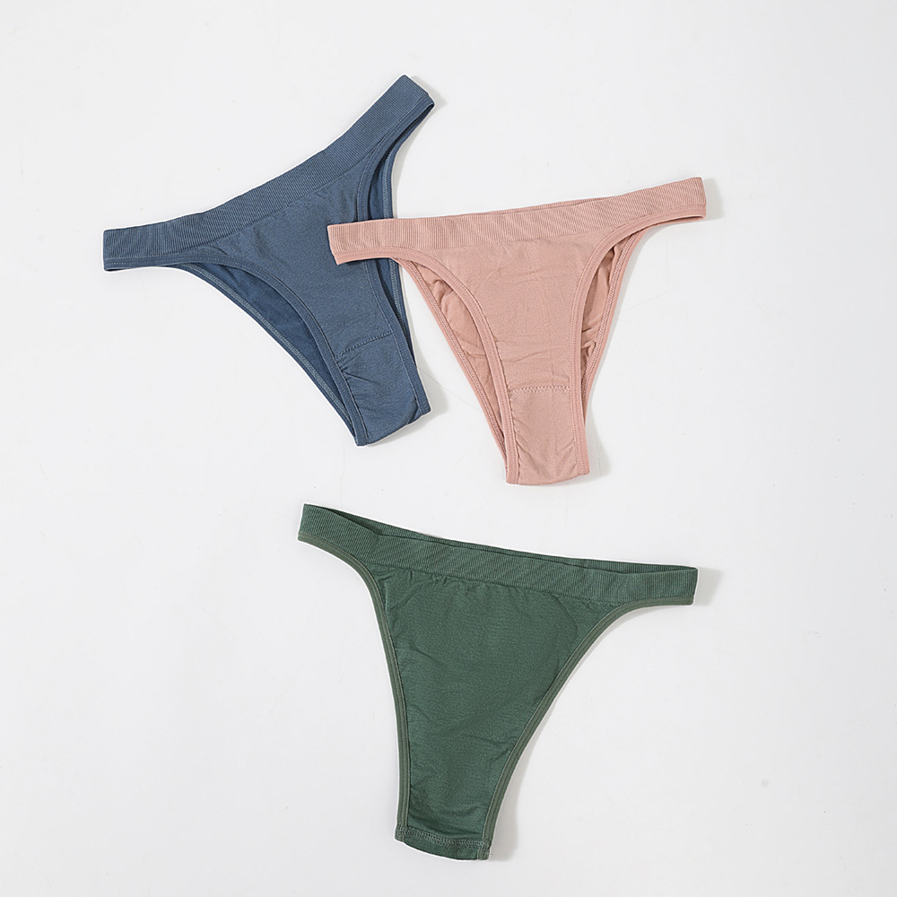 Mujeres europeas y americanas sin costuras de color sólido cómodo bajo la cintura de la cabeza de la ropa interior Tanga deportiva más el tamaño sin costuras sexy elástico T-string