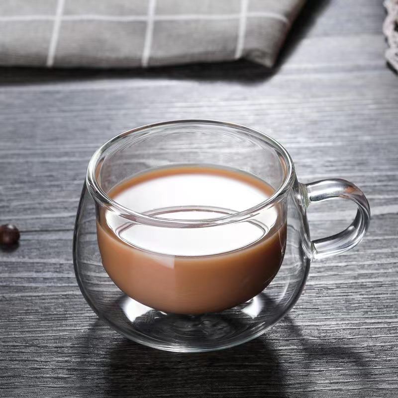 Vaso de vidrio de doble capa con forma de huevo en stock para uso doméstico, taza de café transparente con asa, vaso de agua de doble capa con aislamiento de vidrio de borosilicato alto.