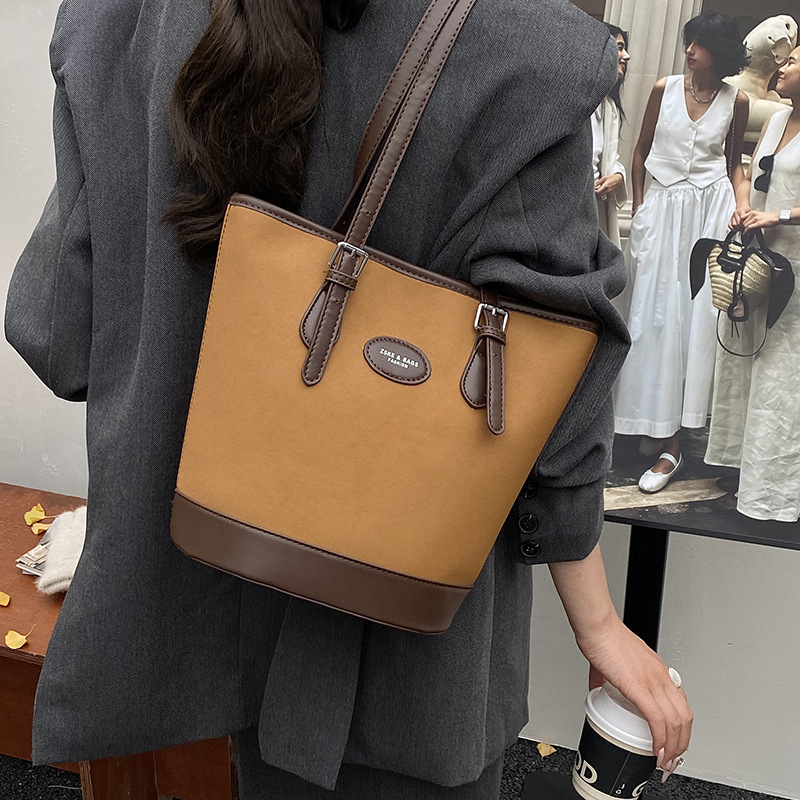 Cross-border 2025 otoño y invierno nuevo retro leopardo bolso de brazo de moda de viaje bolso de cubo de mujer moda coreana bolso de hombro