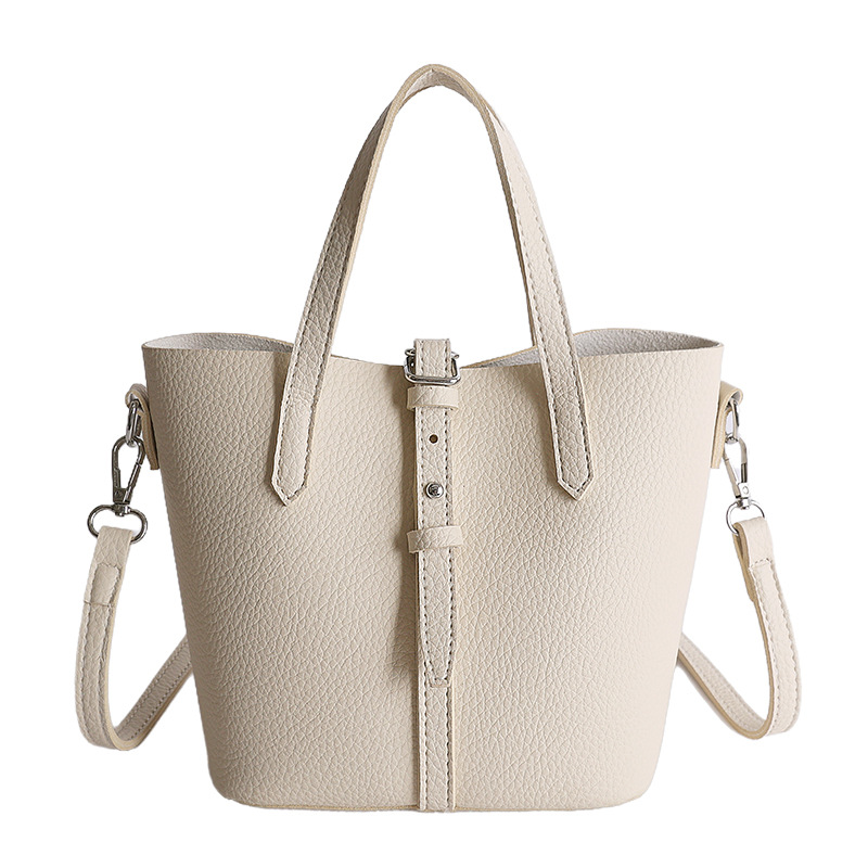 Nicho coreano canasta de platos portátiles bolsos de cubo para mujeres 2026 ventas calientes nuevas bolsas de hombro casuales de gran capacidad