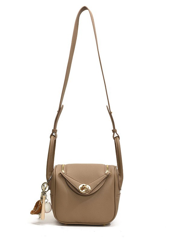 Bolsa de almohada portátil de alta sensación para mujeres 2025 nuevo estilo transfronterizo de moda coreana lichi mochila de hombro