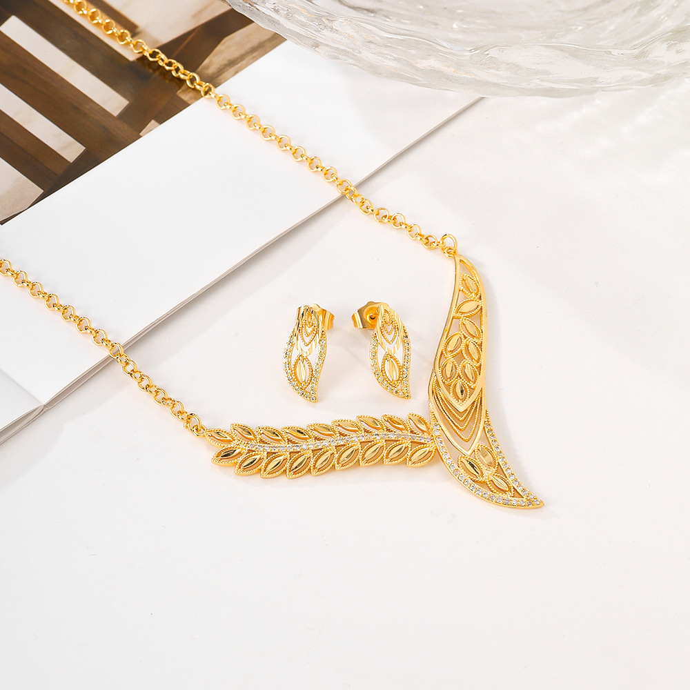 Joyas populares transfronterizas del Medio Oriente, aretes de moda, collares, pernos de piedra de bronce, dos piezas, joyas
