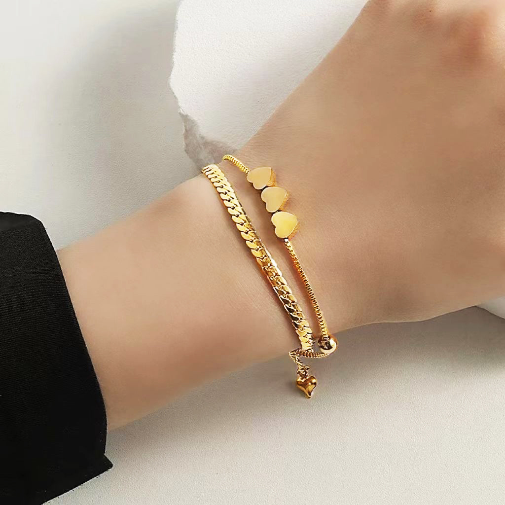 Europa y los Estados Unidos personalidad simplificada collar de hueso de serpiente joyas temperamento amor diseño colgante de acero de titanio conjunto de joyas para mujeres