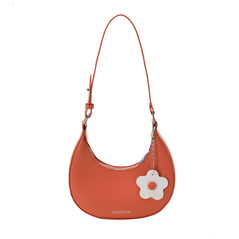 Bolso de mano transfronterizo para mujeres 2024 nueva textura coreana bolso de hombro axilar simple colgante de flores bolso de luna media luna