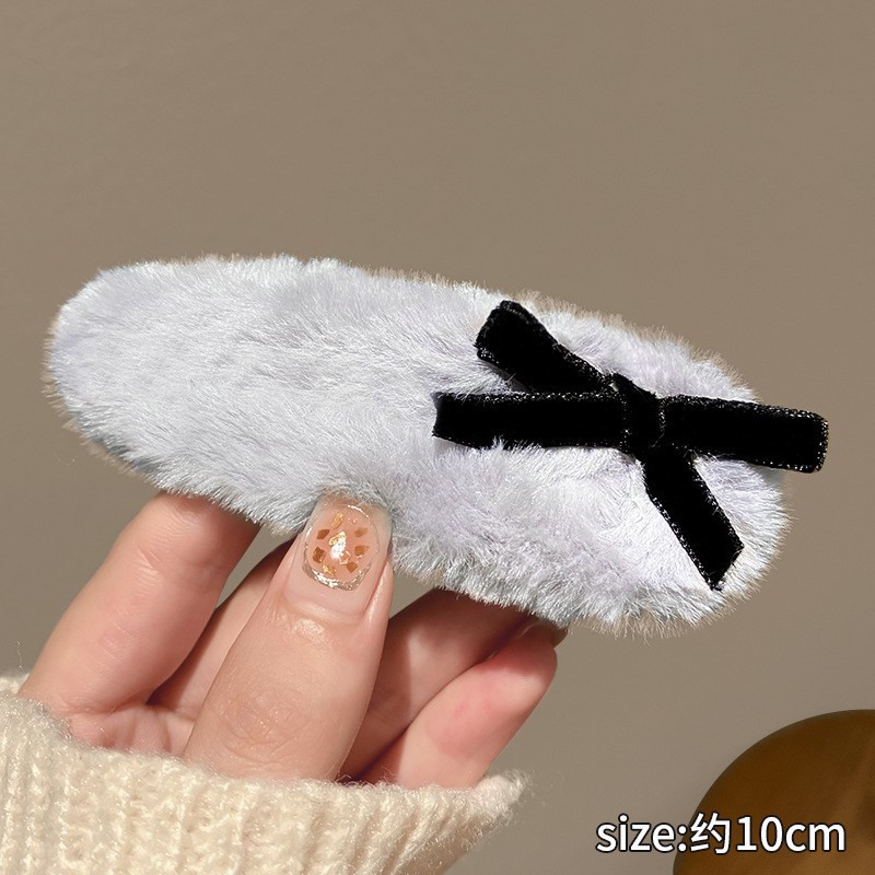 Clip de cabello de flor de leopardo para mujeres clip de cabello de alto nivel frente clip de frangeo 2025 nuevo clip lateral clip de cabello toque