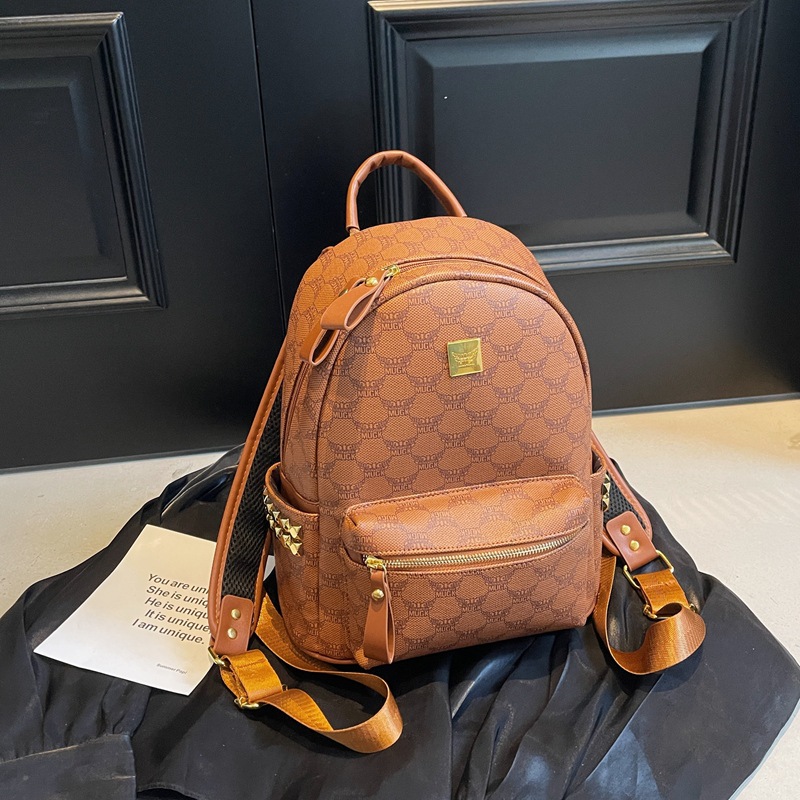 Mochila de estilo universitario de moda para mujeres 2025 nuevo viaje de viaje mochila de estudiantes adorable oso impresión mochila de moda