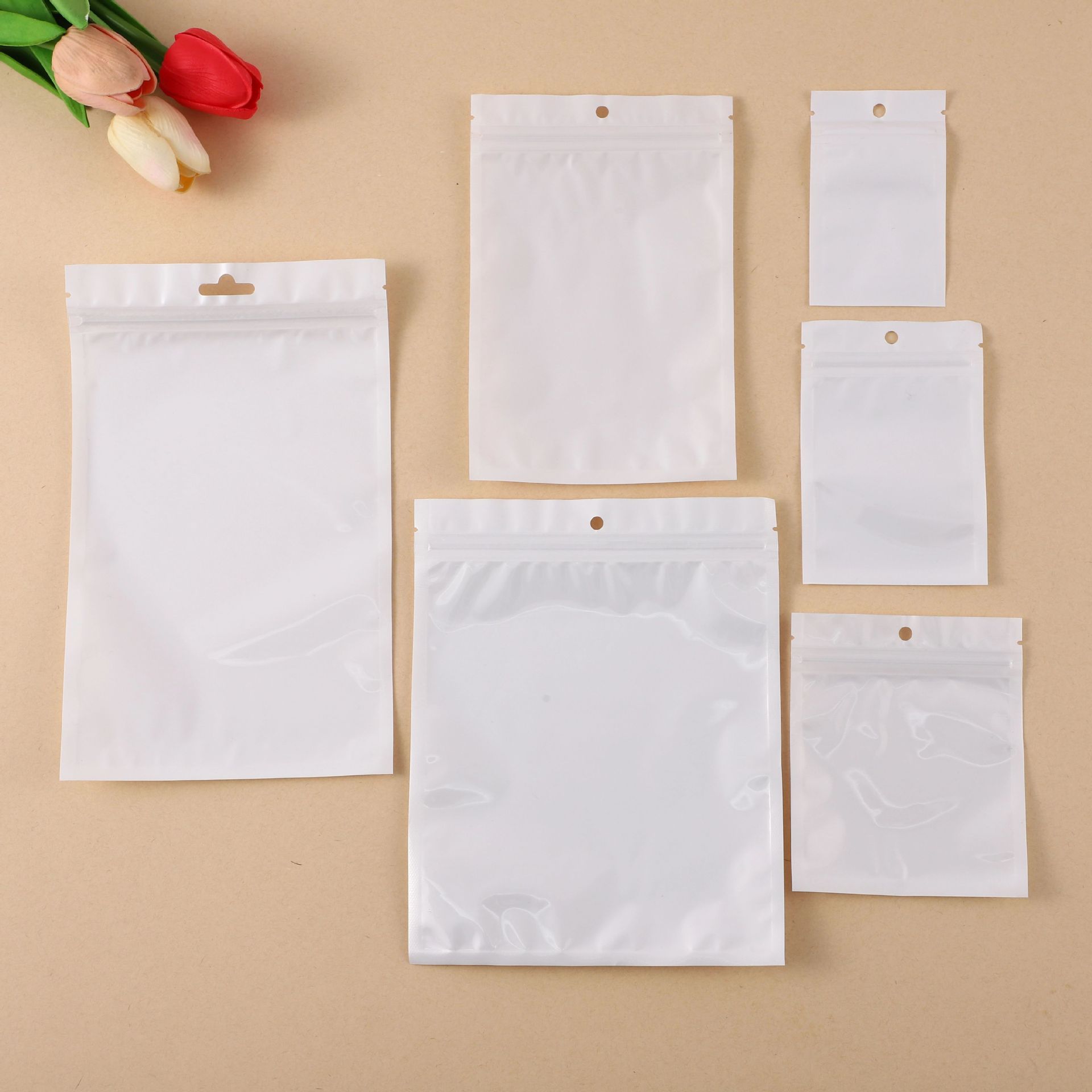 Fabricante de película nacarada, yin y yang, bolsa de hueso, bolsa sellada de plástico, bolsa sellada de plástico, bolsa de embalaje de joyería Xiyin transfronteriza