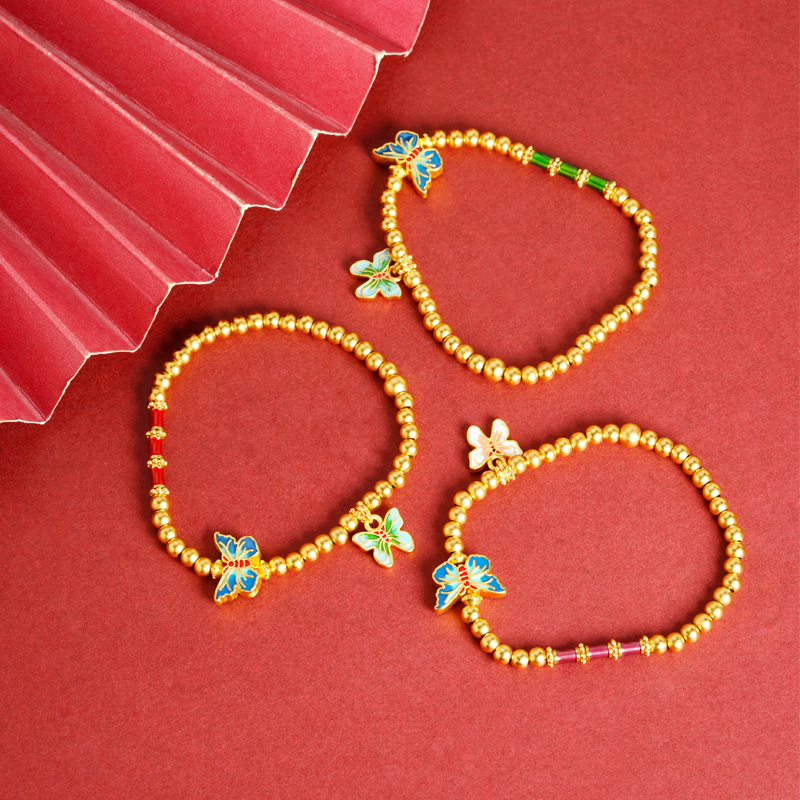 Brazalete de mariposa de esmalte de oro de arena vietnamita no se desvanece durante mucho tiempo. nuevo estilo chino retro nicho sensación de diseño de joyería de cuentas