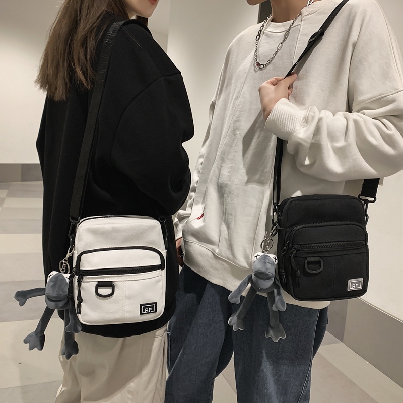 new pattern Chaopai personality street ins canvas Satchel man The single shoulder bag solar system leisure time work clothes Inclined shoulder bag