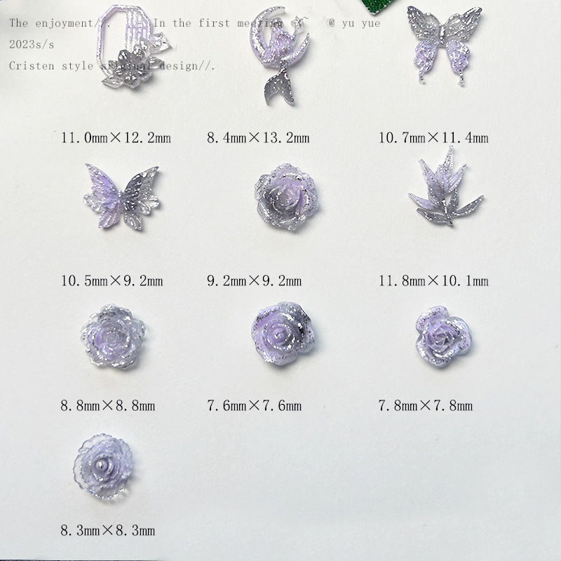 Nueva joyería de uñas de estilo gris-púrpura salvaje de estilo ins mezclada luminosa tridimensional de flores pequeñas accesorios de armadura al por mayor